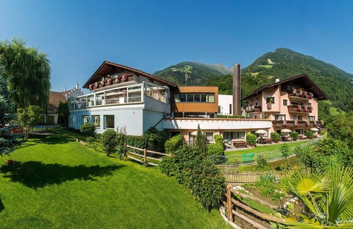 Saltusio Apartamento | Apartamento vacacional "Alpenhof Lodge Butterblume" con vistas a la montaña, piscina y Wi-Fi