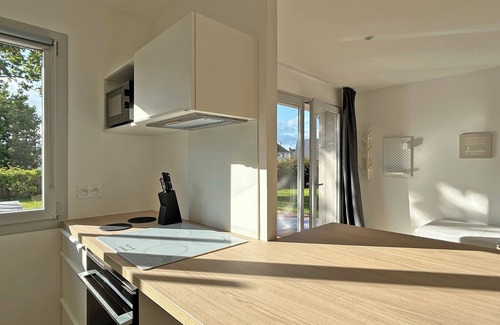 Hillion Apartamento | Apartamento vacacional "Au P'tit Colombier" con terraza privada y jardín compartido