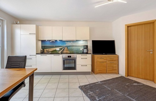 Gaienhofen Apartamento | Apartamento vacacional 'Bruttel' con piscina privada, terraza comunitaria y Wi-Fi