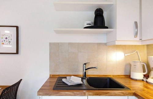 Seeheilbad Graal-Muritz Apartamento | Apartamento vacacional "Strandferienwohnung" con terraza privada, jardín privado y Wi-Fi