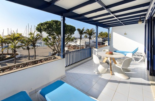Puerto Calero Apartamento | Apartamento vacacional "Vistagua" con bonita decoración y amplia terraza con vista al mar