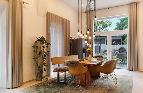 Achern Apartamento | Apartamento vacacional con jardín y encanto: Vivienda con estilo en la histórica casa de calderas