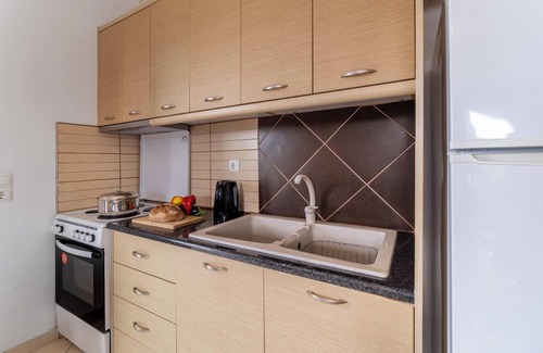 Tsoukaladhes Apartamento | Apartamento vacacional con vistas al mar 'Α' con piscina, jardín, terraza y Wi-Fi