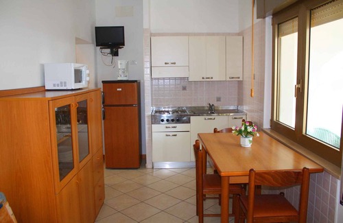 Lignano Sabbiadoro Apartamento | Apartamento vacacional con aire acondicionado en el mar