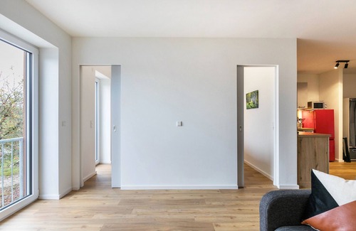 Husbyholz Apartamento | Apartamento vacacional 'Zum Krähenholz 9' con jardín comunitario y Wi-Fi