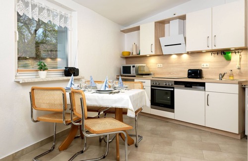Gollwitz Apartamento | Holiday apartment Erika - Cozy half of the house in Gollwitz for 5 people and a