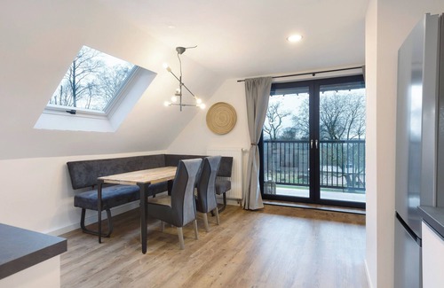 Langenbach bei Kirburg Apartamento | Apartamento vacacional 'Moderne Ferienwohnung' con jardín comunitario, balcón y Wi-Fi