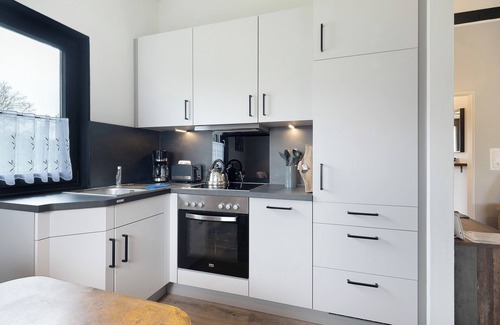 Hollern Casa | Casa de vacaciones 'Ferienhaus Elb-diek' con terraza privada, jardín privado y Wi-Fi