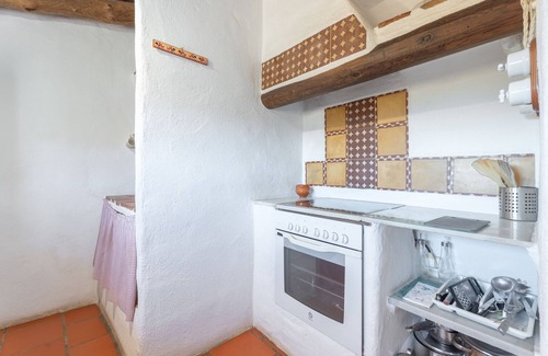 La Torre d'En Besora Casa | Casa de vacaciones 'El Cup' con vistas a la montaña, piscina compartida y terraza privada