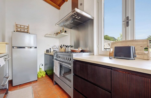 Gargnano Casa | Casa de vacaciones 'Casa con Impresionantes Vistas al Lago y Montaña' con vistas al lago, piscina privada y Wi-Fi