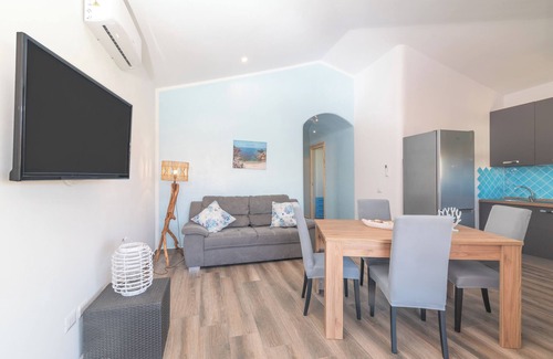 Palau Casa | Casa de vacaciones 'Mavi Primo Piano' con terraza privada, Wi-Fi y aire acondicionado