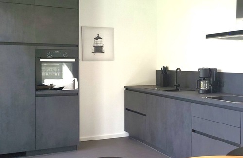 Pouch Casa | Casa de vacaciones 'Schlossterrassen 8b' con vistas al lago, terraza privada y Wi-Fi