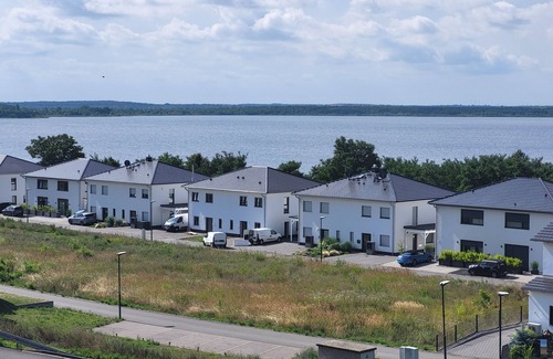 Pouch Casa | Casa de vacaciones 'Schlossterrassen 8b' con vistas al lago, terraza privada y Wi-Fi