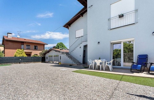 Arona Casa | Casa de vacaciones 'Villa Lilia Appartamento Verde' con jardín compartido y Wi-Fi