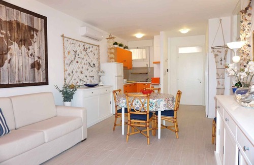 Porto Santa Margherita Apartamento | Apartamento vacacional Amplio apartamento de dos dormitorios justo en la playa.
