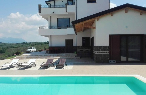 Caiazzo Apartamento | Homerez - Apartamento para 7 pers. con piscina compartida en Bosco di Caiazzo