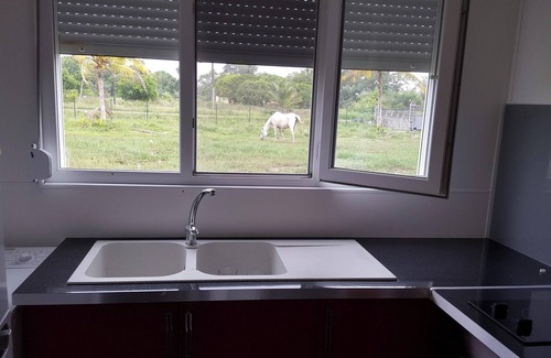 Macouria Casa | Homerez - Casa acogedora en Macouria con jardín y aire acondicionado.