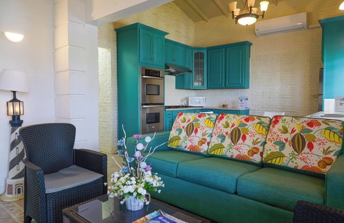 Koyari Apartamento | Homey 2-bdrm Apartment with Pool and Garden, 5 min to Eagle Beach and Palm Beach