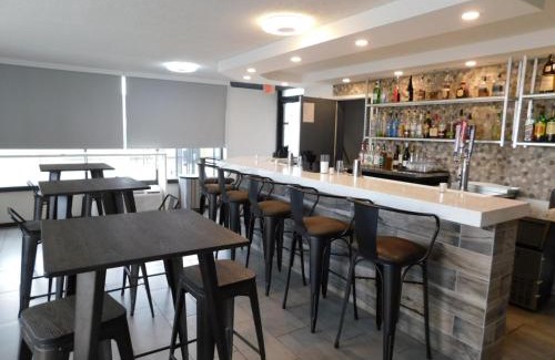 Pines Village Hotel | Hotel 10 Extended Stay