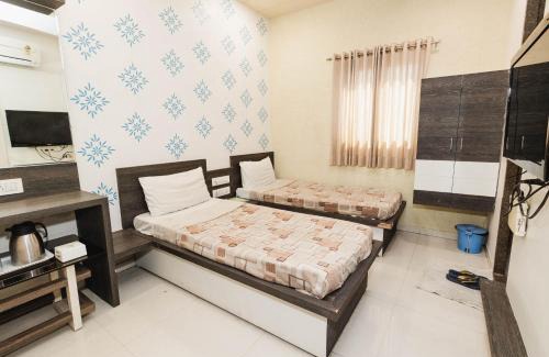 Sayajiganj Hotel | Hotel Amber Railway station