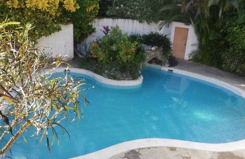 Cabarete Apartamento | Hotel bedroom in Cabarete, steps from sandy beach