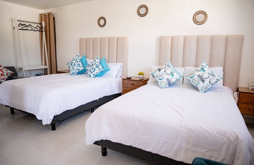 El Chiflon Hotel | HOTEL BUNGALOWS CASA BLANCA