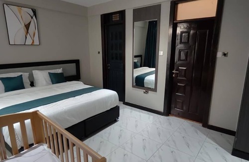 Siaya Cama Y Desayuno | Hotel Lourdes Siaya