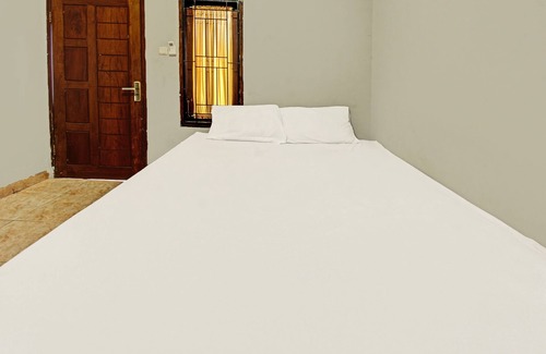 Kecamatan Janapria Hotel | SPOT ON 91981 Diwi Homestay