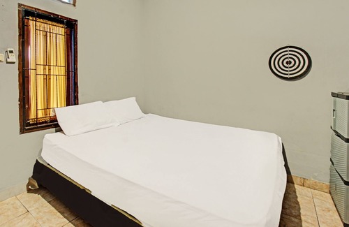 Kecamatan Janapria Hotel | SPOT ON 91981 Diwi Homestay