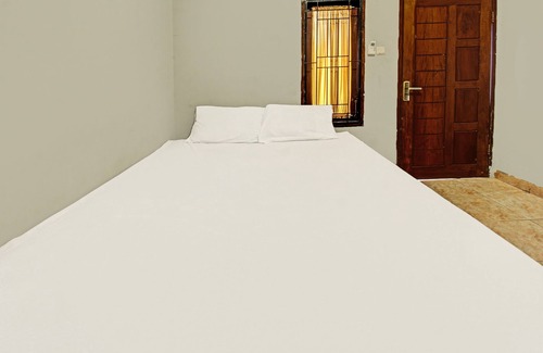 Kecamatan Janapria Hotel | SPOT ON 91981 Diwi Homestay