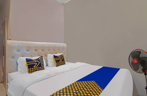 Pekanbaru Hotel | Hotel O Putri Guest House Syariah Near SPBU Rimbo Panjang