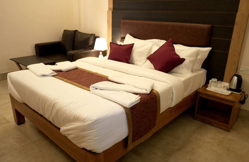 Virarajendrapet Hotel | hotel orchard coorg