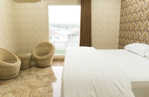 Palu Casa | Hotel Raja Akas