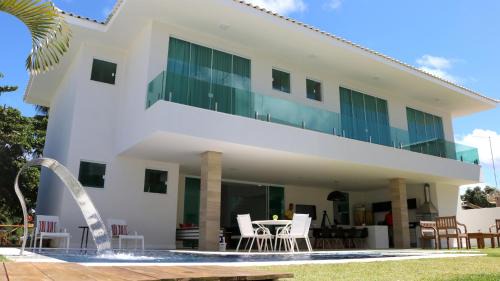 Parafuso Casa | Casa 6 Suites a 80 metros de la playa en Guarajuba