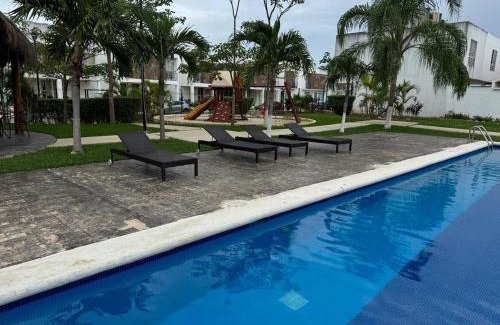 Jimenez Casa | House in front of the Maya Playa del Carmen train