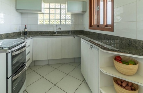 Barra de Ibiraquera Casa | casa en la playa con vistas espectaculares y un gran jardín