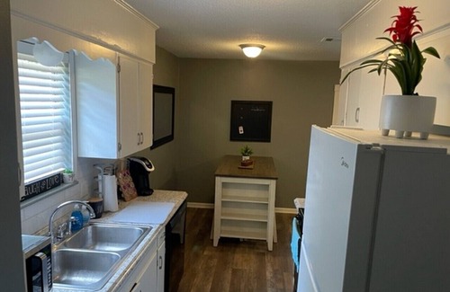 Conway Casa | Casa con jardin cercado, cerca de instituciones educativas y médicas en Conway.