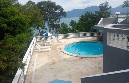 Praia das Cigarras Casa | House with wonderful views, swimming pool and barbecue! Near Cigars beach