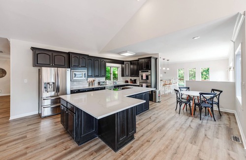 Steele Creek Casa | HUGE Lake Mansion w/ Beach + 2 Great Rooms + Movie Thtr + Dock + Boat Avail