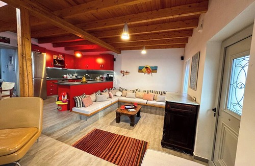 Dorida Casa | Ianos Maisonette - 1880s Seafront Stone House with King Beds by Hilton