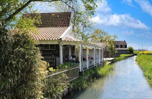Oterleek Casa | Idyllisch en knus huisje met prachtige veranda.