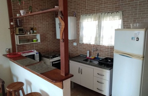 Praia Grande Casa | Casa Ilhabela con vista al mar y vacaciones a 250 mts de la arena.