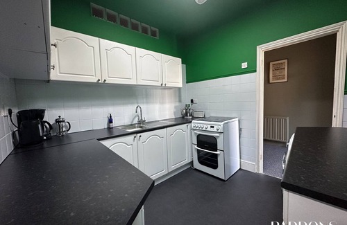 Tavistock Apartamento | Paddons -Apartamento-Baño con bañera