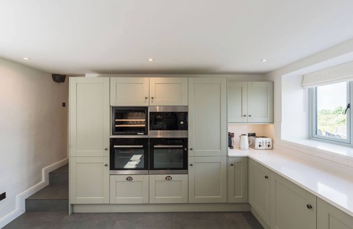 Pentraeth Casa | Incredible stay overlooking Red Wharf By sleeping up to 8 guests with hot tub & garden lounge area
