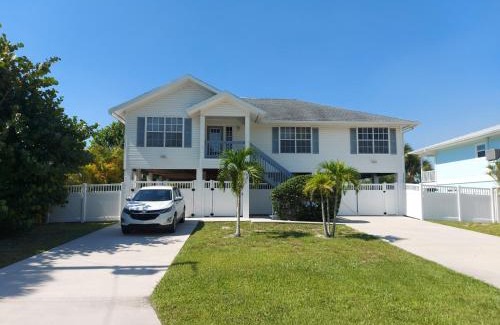 Fort Myers Beach Villa | Island Villa with 33 Foot Infinity Pool, Dolphin Visits