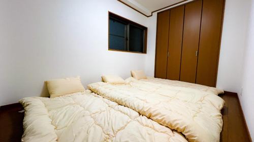 Minato Apartamento | kanau 駅から2分 USJ空庭難波梅田まで10分!まるごと一軒家貸し切り!大人数宿泊可能!駐車場有