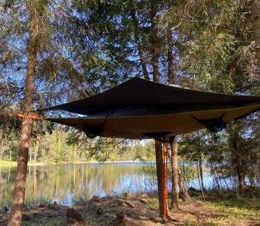 Antsla Parish Otro | Karula Stay - Exclusive Lakeside Camper & Floating Treetent Experience