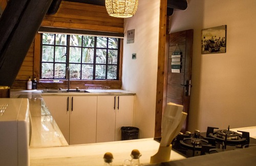 Kiambu Cabina | Kivulini A-Frame Cabin Forest-Wake to 360° forest views in a reimagined retreat.