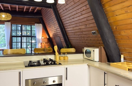 Kiambu Cabina | Kivulini A-Frame Cabin Forest-Wake to 360° forest views in a reimagined retreat.