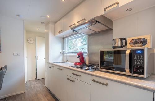 Krachtighuizen Chalet De Esquí | Knus chalet op de Veluwe – natuur, rust & gratis e-bikes - naast Saunadromen